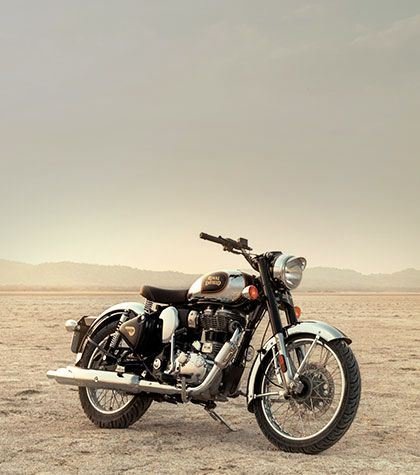 A chrome Royal Enfield Classic 350 on a high-desert plain